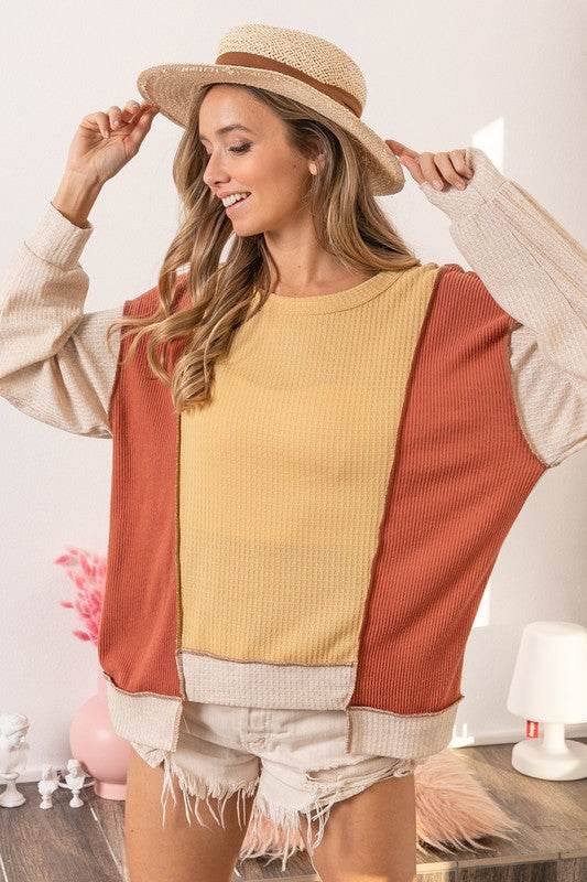 BiBi Waffle-Knit Exposed Seam Color Block Uneven Hem Top - Mayzelyn Shop